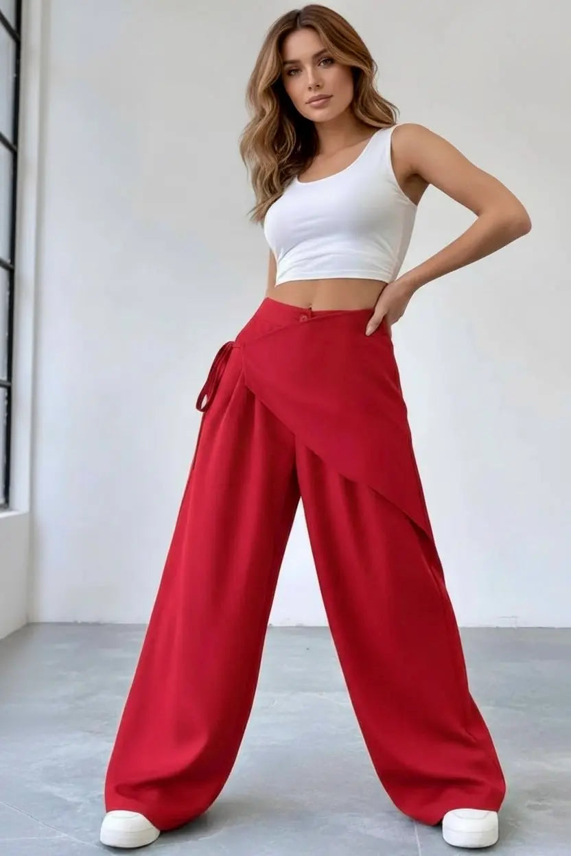 Daverri Wrap-Front Wide-Leg Pants in red with draped asymmetrical design