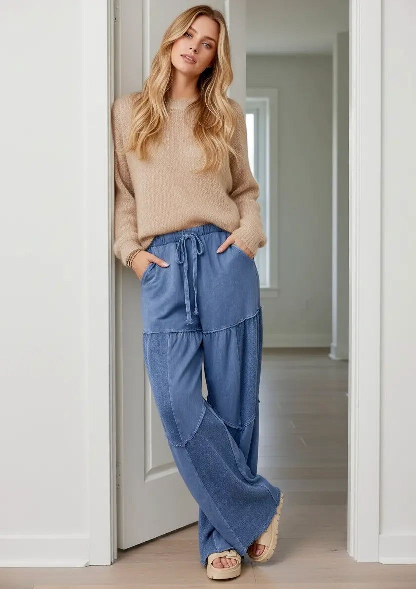 Woman wearing mineral washed waist tie pants and a top