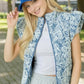 Blue floral embroidered denim puffer vest with puff sleeves