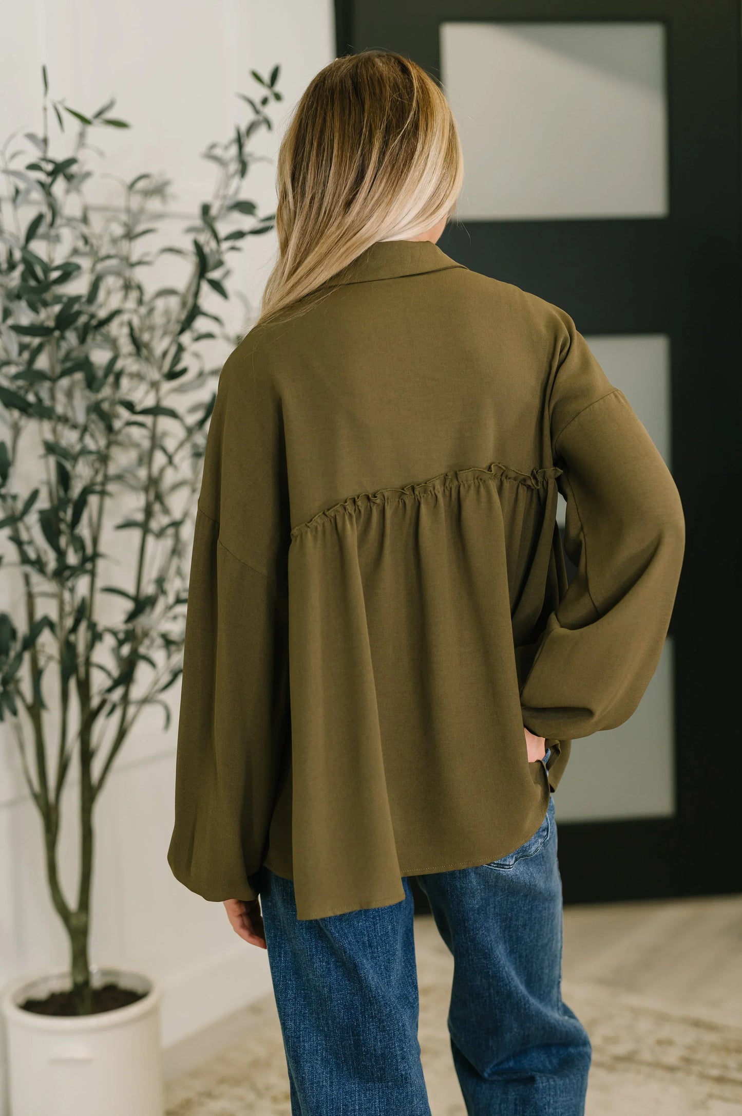 Olive green She’s Got A Way babydoll blouse with ruffled hem