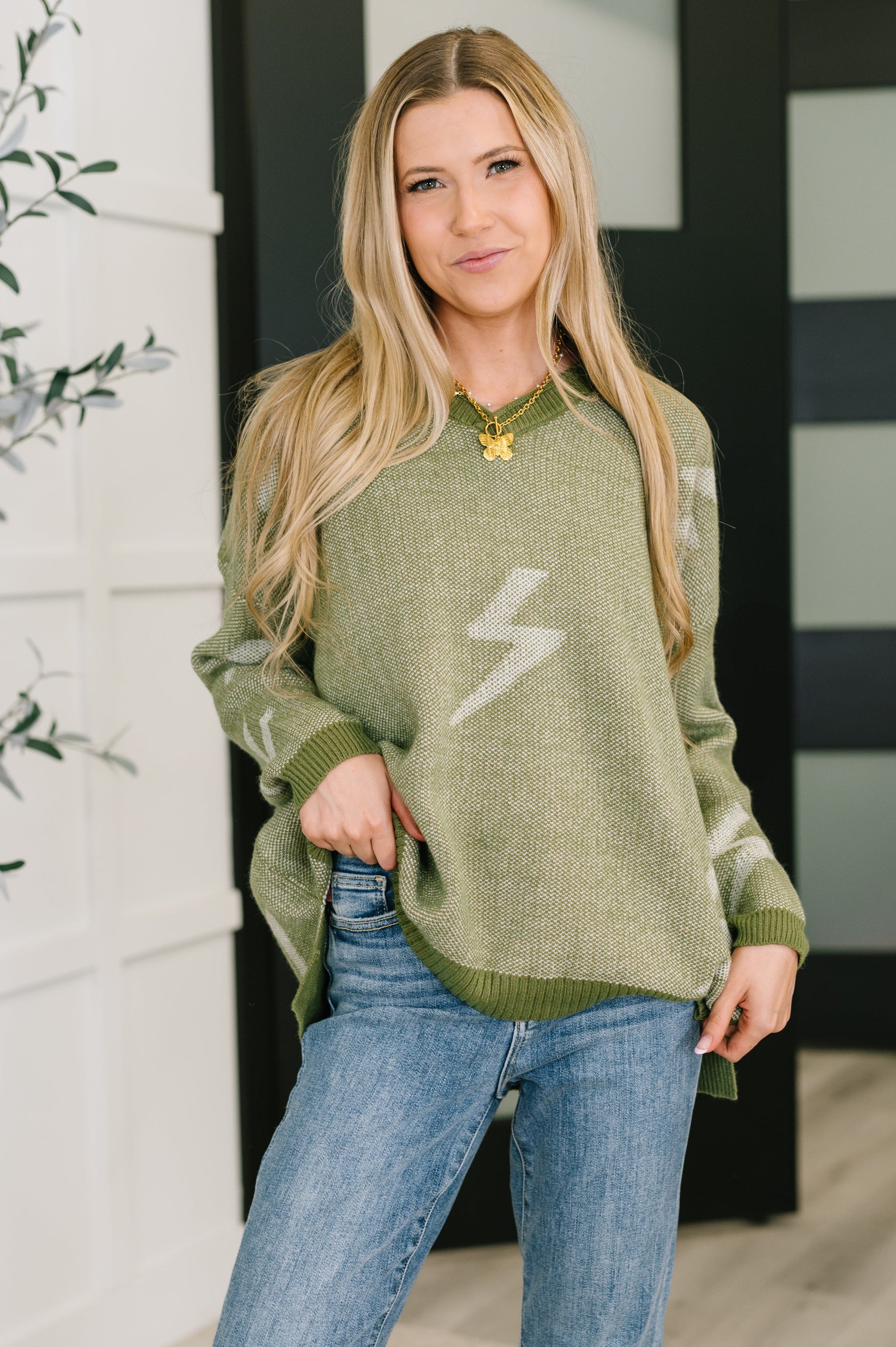 Olive Shock Value V-Neck Sweater with white lightning bolt
