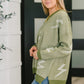 Olive green Shock Value V-Neck Sweater with white lightning bolt knit pattern
