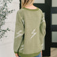 Olive green oversized Shock Value V-Neck Sweater with white lightning bolts