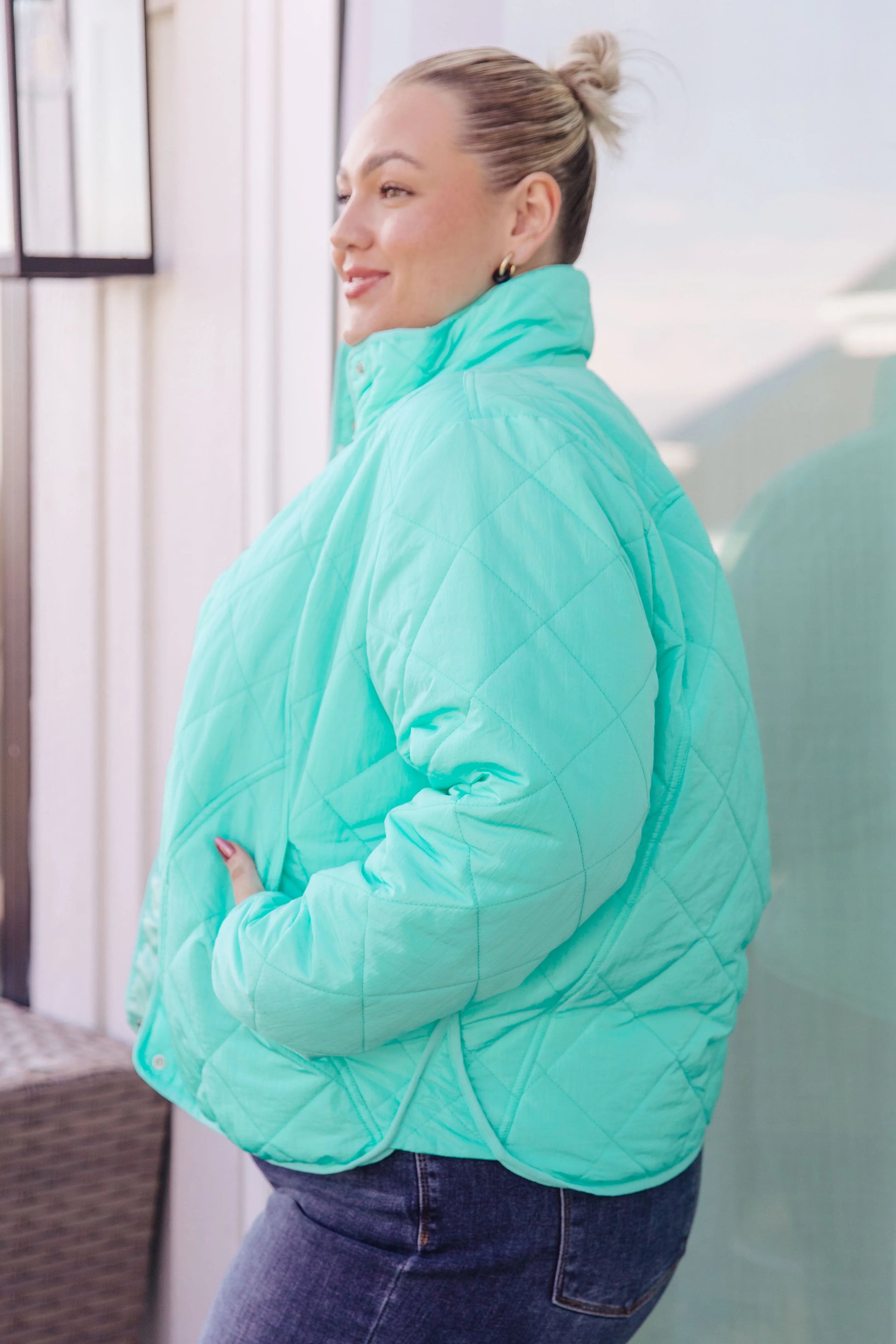 Bibi Mock Neck Puffer Jacket in mint green with quilted design and high collar