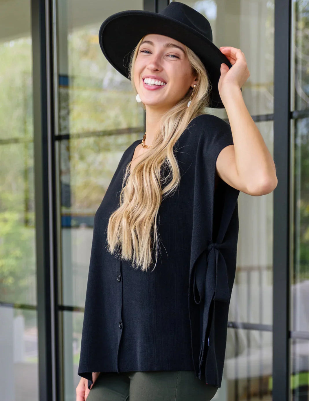 Black felt wide-brimmed hat with bow on Andree by Unit top