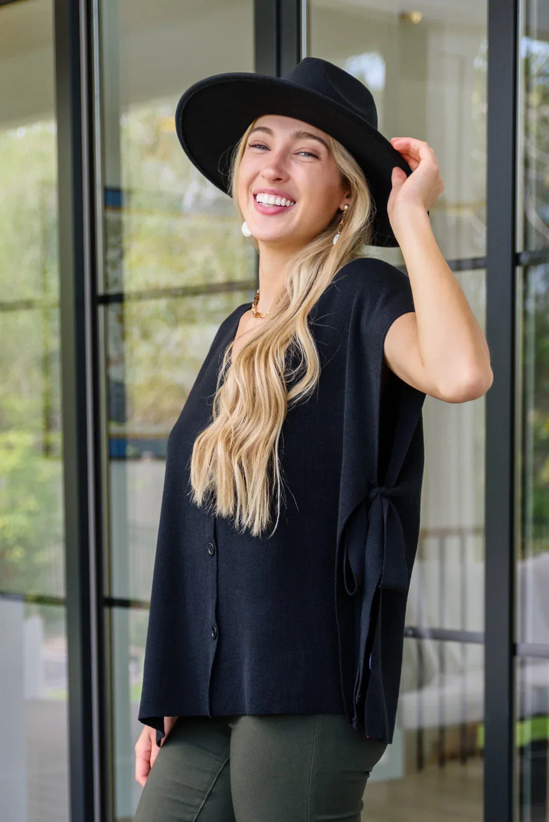 Black felt wide-brimmed hat with bow on Andree by Unit top