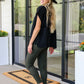 Andree by Unit black side tie tunic with olive leggings and snakeskin booties