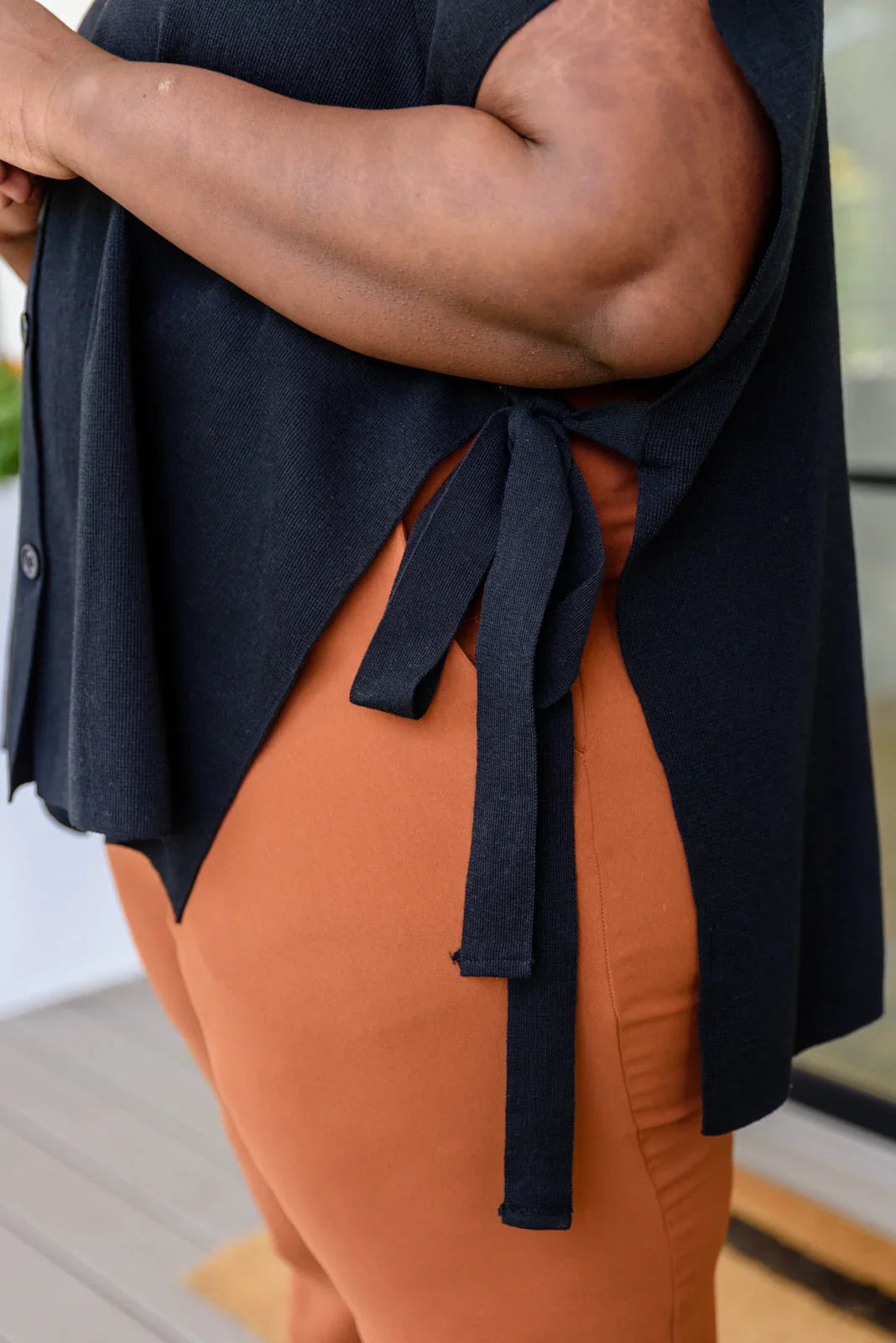 Andree by Unit Finale black side tie sleeveless top with orange leggings