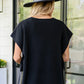 Classic black fedora with wide brim and felt band on Andree top