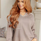 Sew In Love Exposed Seam V-Neck Pullover in soft gray with silver trim