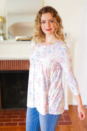 Feeling Fun Blue & Pink Floral Ribbed Babydoll Ruffle Top | Daverri Fashions