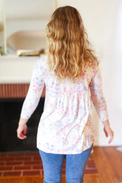 Feeling Fun Blue & Pink Floral Ribbed Babydoll Ruffle Top | Daverri Fashions