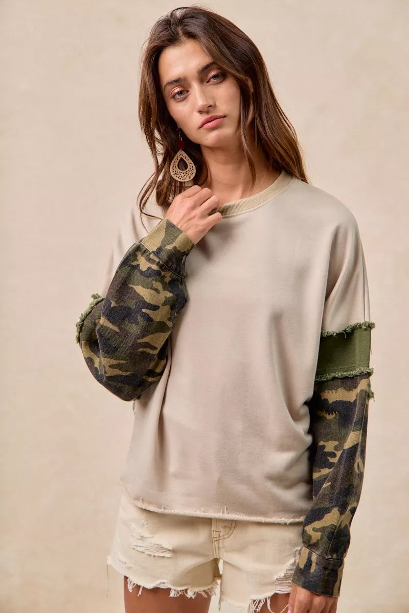 BiBi Camo Sleeve French Terry Top with Frayed Edge | Daverri Fashions