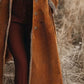 Womens rust-colored suede fringe trim longline coat with frayed edges