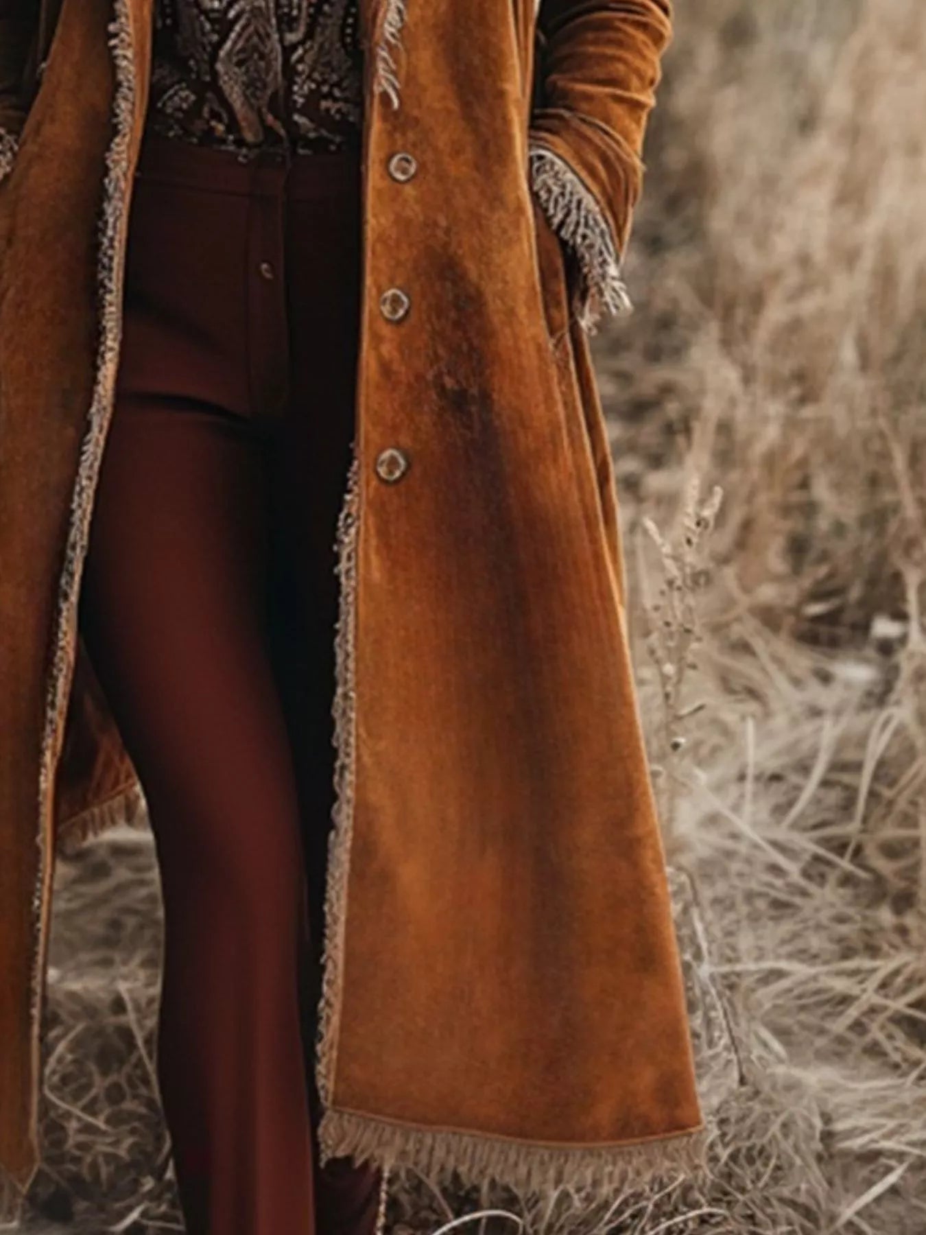 Womens rust-colored suede fringe trim longline coat with frayed edges