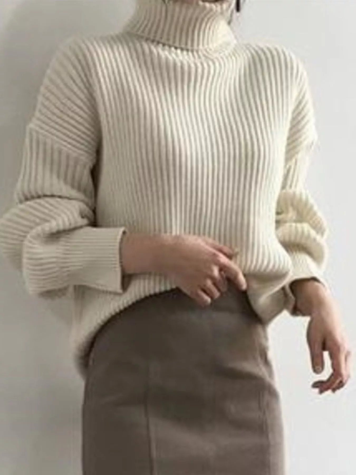 Cream-colored ribbed knit oversized turtleneck sweater, plus size