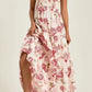 Floral tiered maxi dress in off-white with pink flowers and red satin straps