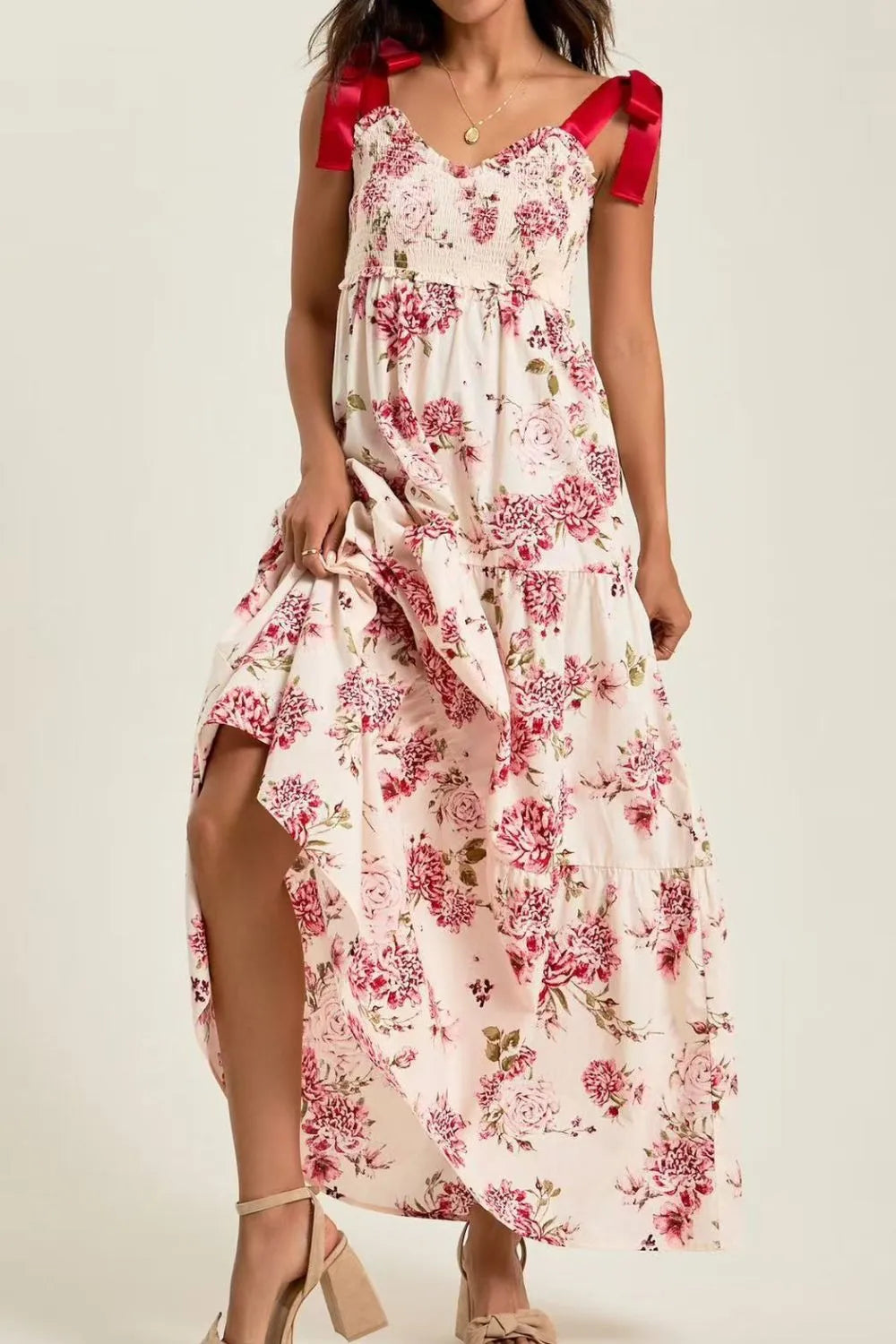 Floral tiered maxi dress in off-white with pink flowers and red satin straps