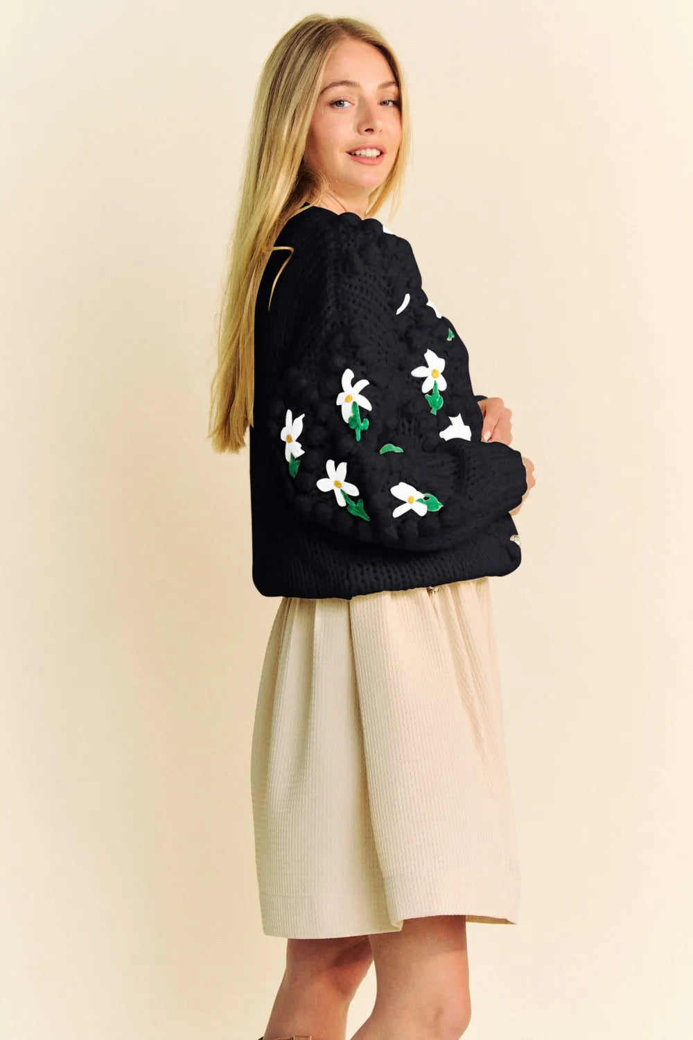 Black knit Davi & Dani cardigan with white green daisy embroidery
