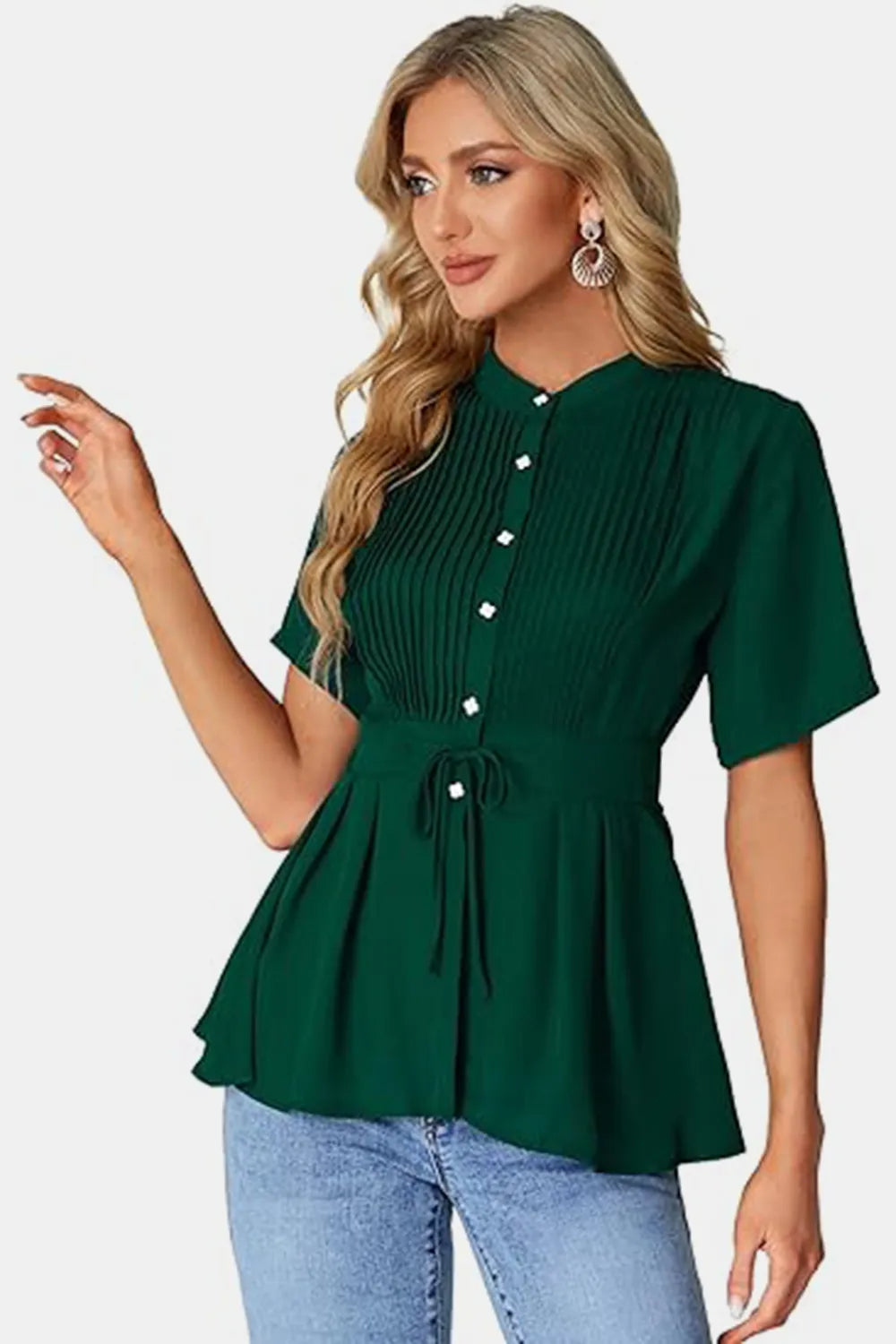 Emerald green peplum blouse with tied round neck and pleated front