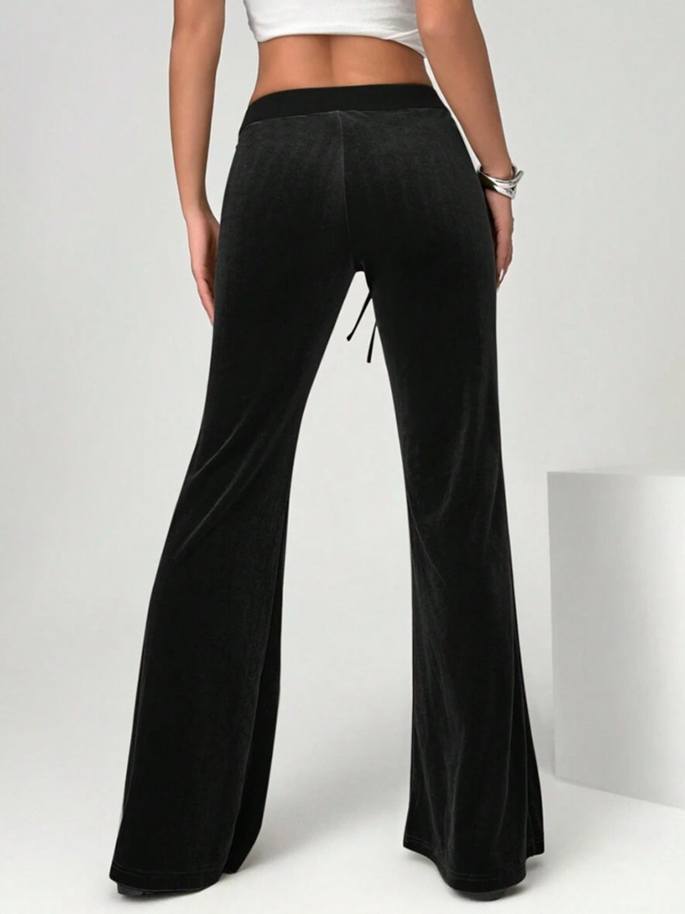 Daverri black velvet flare pants with high-waisted drawstring waistband