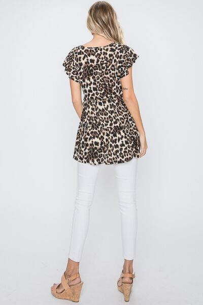 Heimish Full Size Leopard Round Neck Short Sleeve Blouse Plus Size