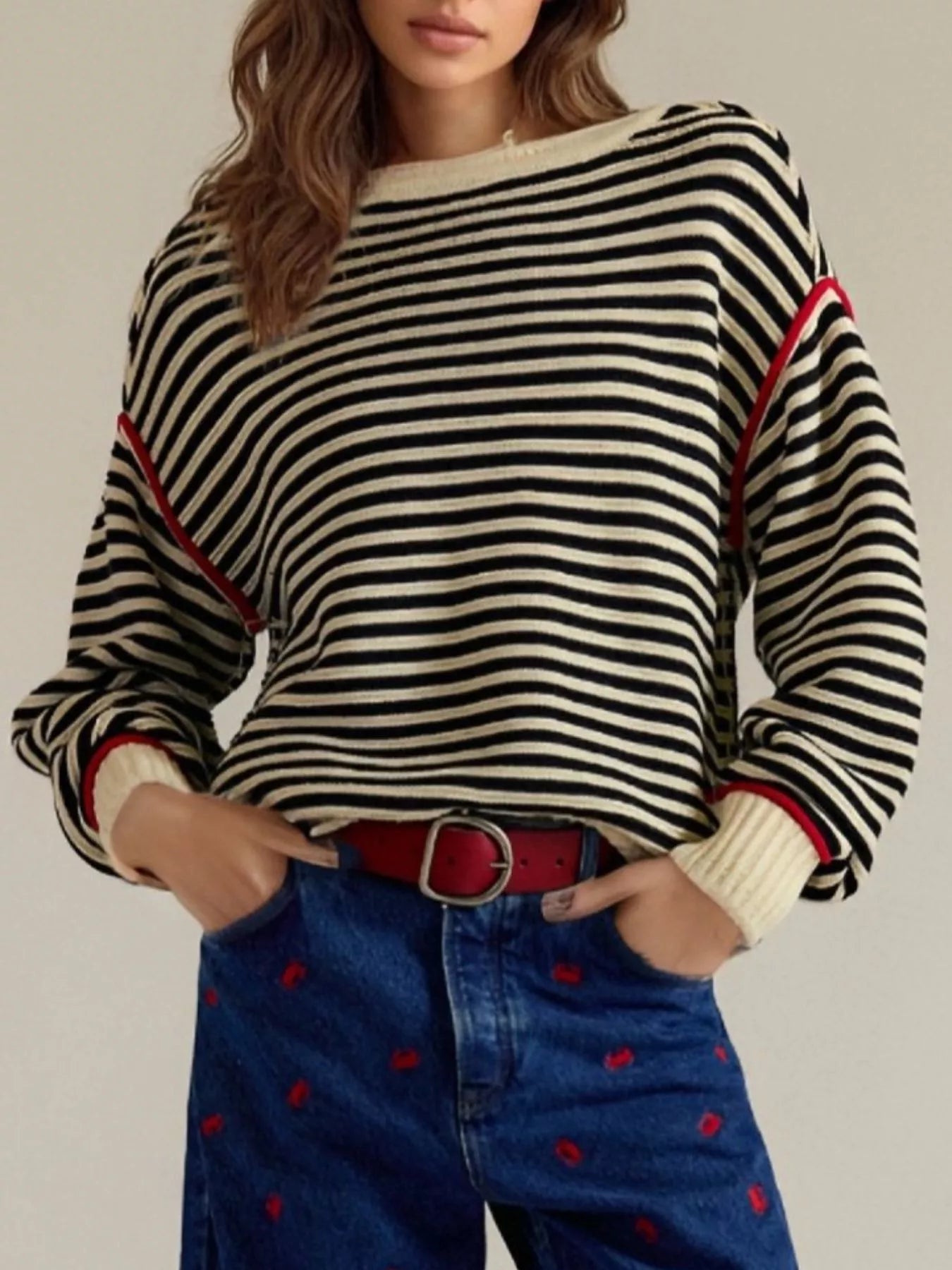 Black and white striped round neck long sleeve knit sweater with red trim