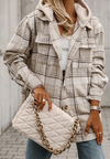 Daverri cream quilted handbag with gold chain strap on shacket