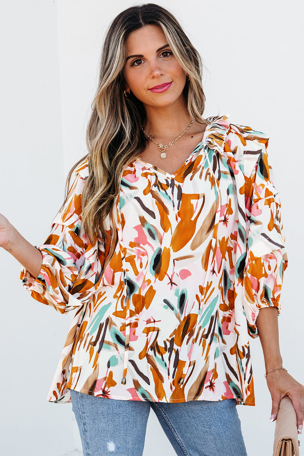 Yellow abstract print drawstring frilled V-neck 3/4 sleeve blouse on white background