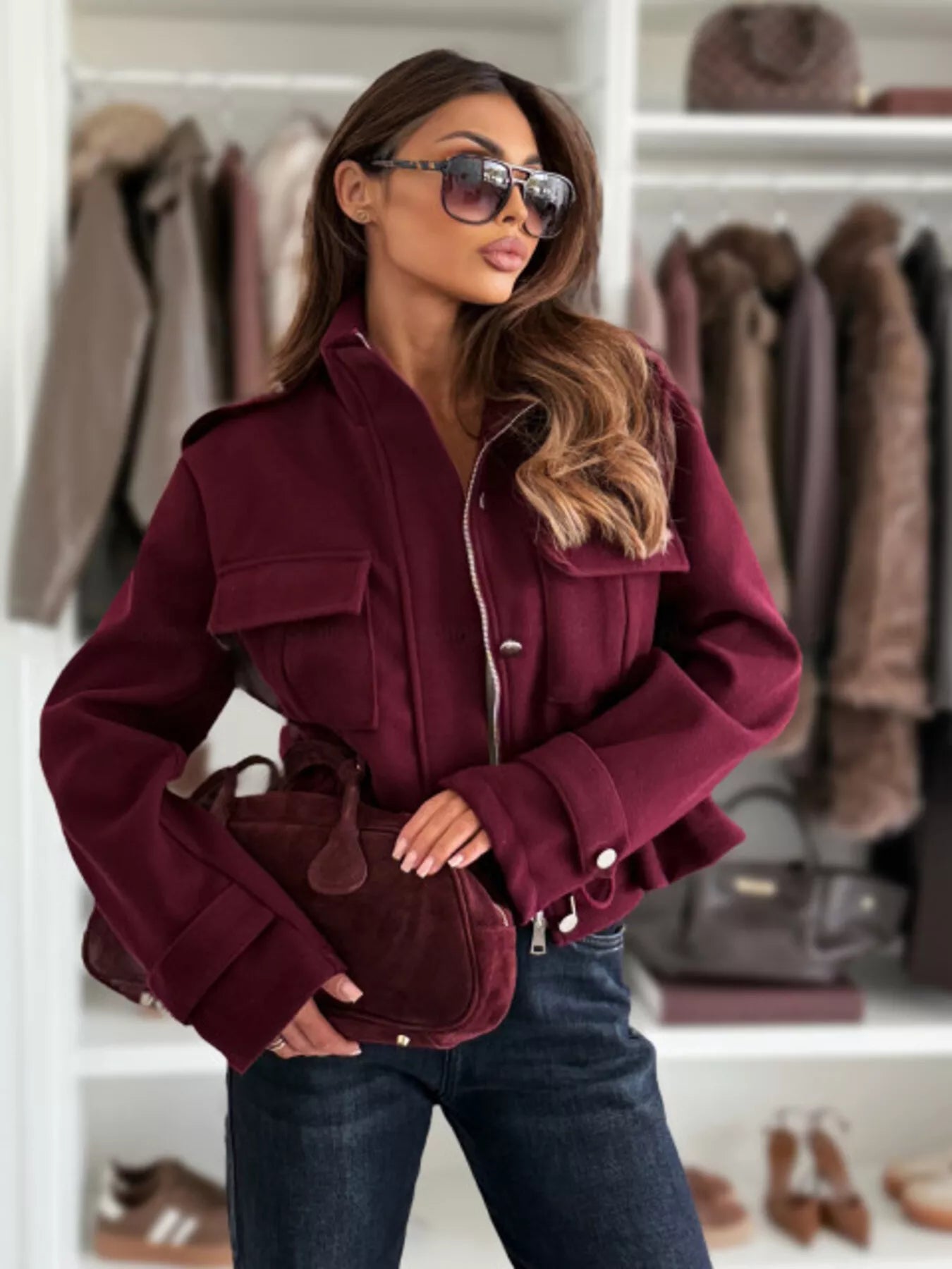 Maroon suede crossbody bag with structured shape in Daverri jacket