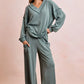 Cozy sage green BiBi ribbed knit loungewear set with V-neck top and wide-leg pants