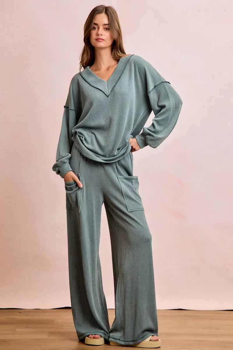 Cozy sage green BiBi ribbed knit loungewear set with V-neck top and wide-leg pants