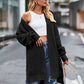 Black long sleeve waffle-knit cardigan with ribbed texture