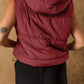 Puffy maroon sleeveless drawstring zip-up hooded vest coat with horizontal stitching
