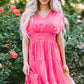 Vibrant pink smocked V-neck cap sleeve mini dress with puffed sleeves