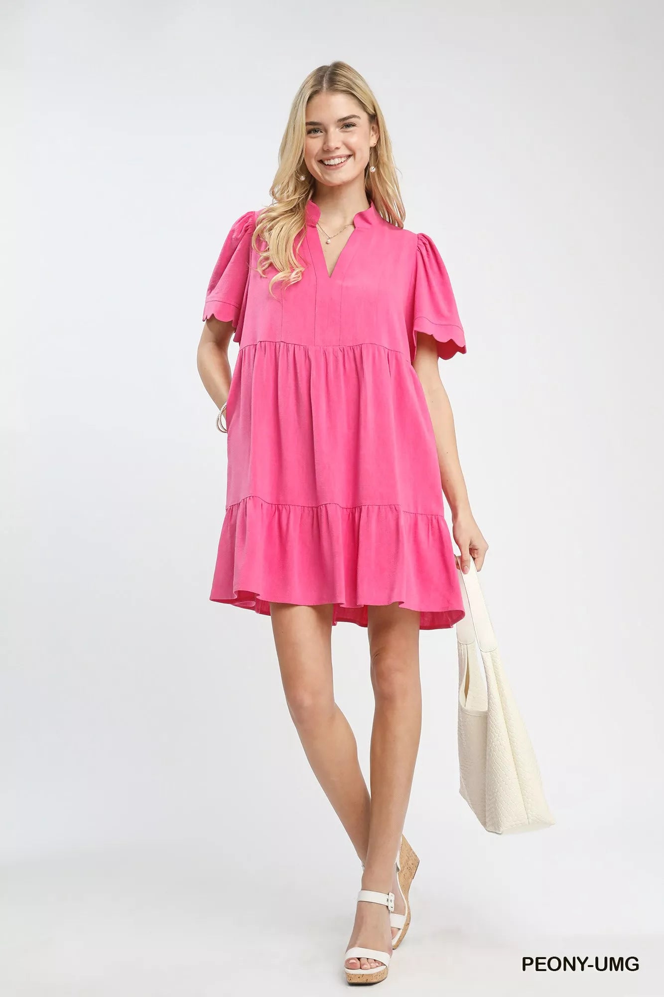 Umgee linen tiered babydoll dress in vibrant pink with scalloped puff sleeves
