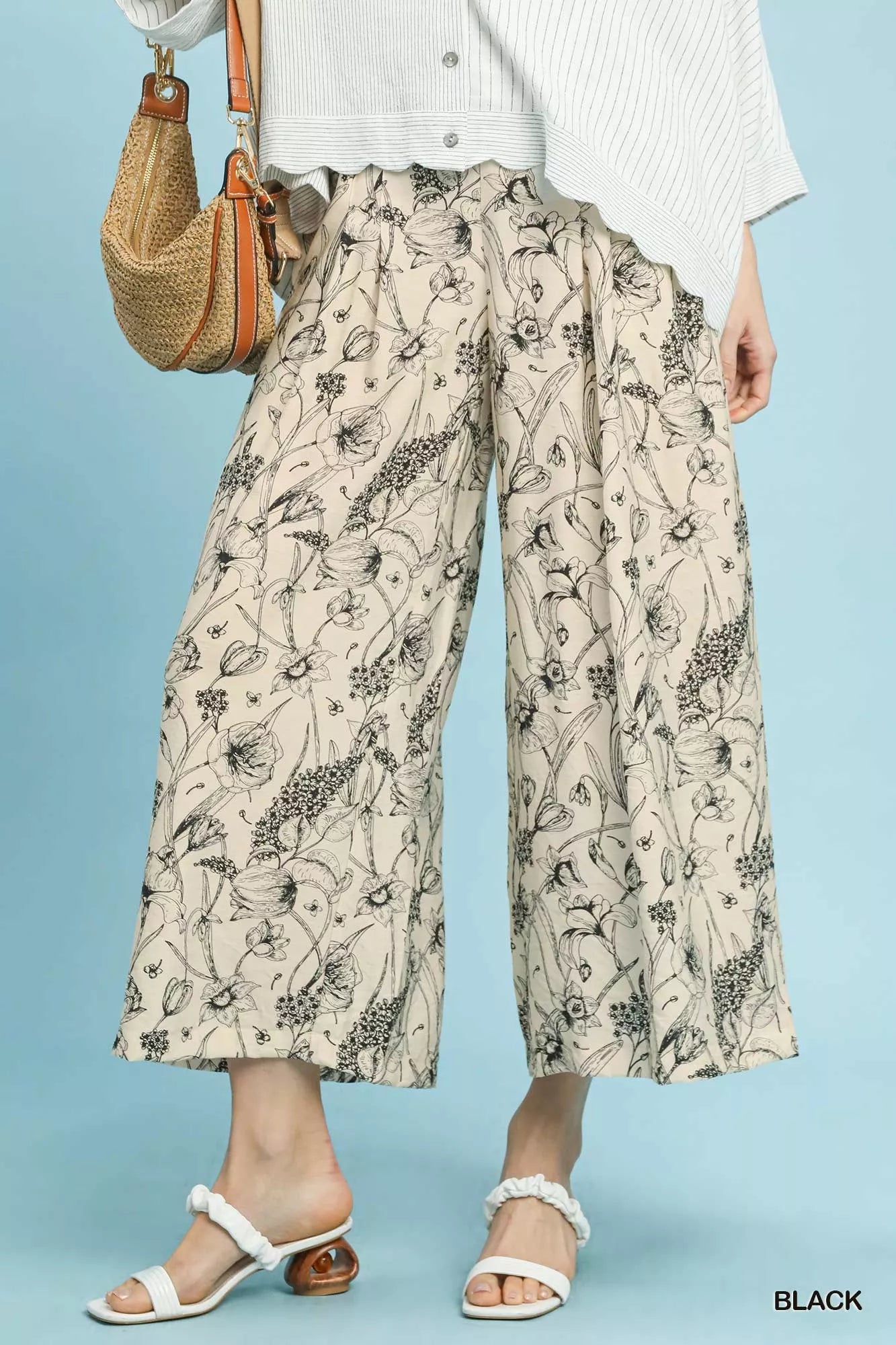 Beige wide-leg Umgee two-tone floral print pants with black botanical design