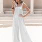 White sleeveless wide leg jumpsuit with tie shoulder straps and subtle embellishments
