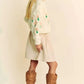 Cream-colored Davi & Dani floral cardigan with embroidered sleeves
