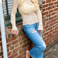Beige lace ruffle trim long sleeve knit blouse with flared cuffs