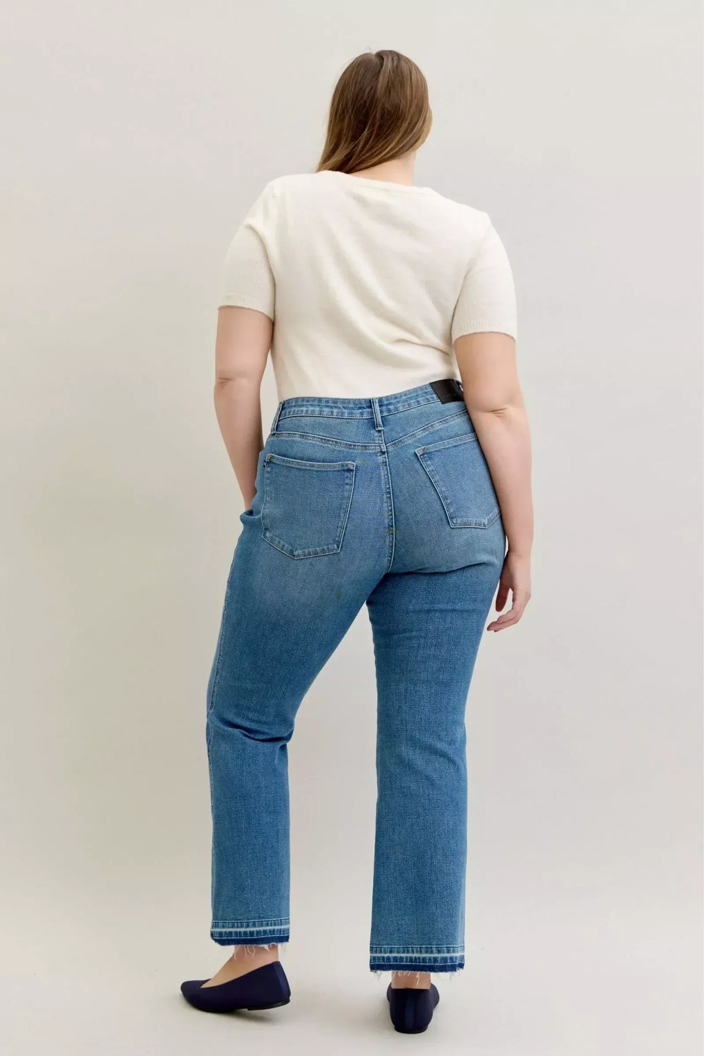 Judy Blue Full Size Mid Rise Slim Bootcut Tummy Control Release Hem Jeans Plus Size - DAVERRI FASHIONS