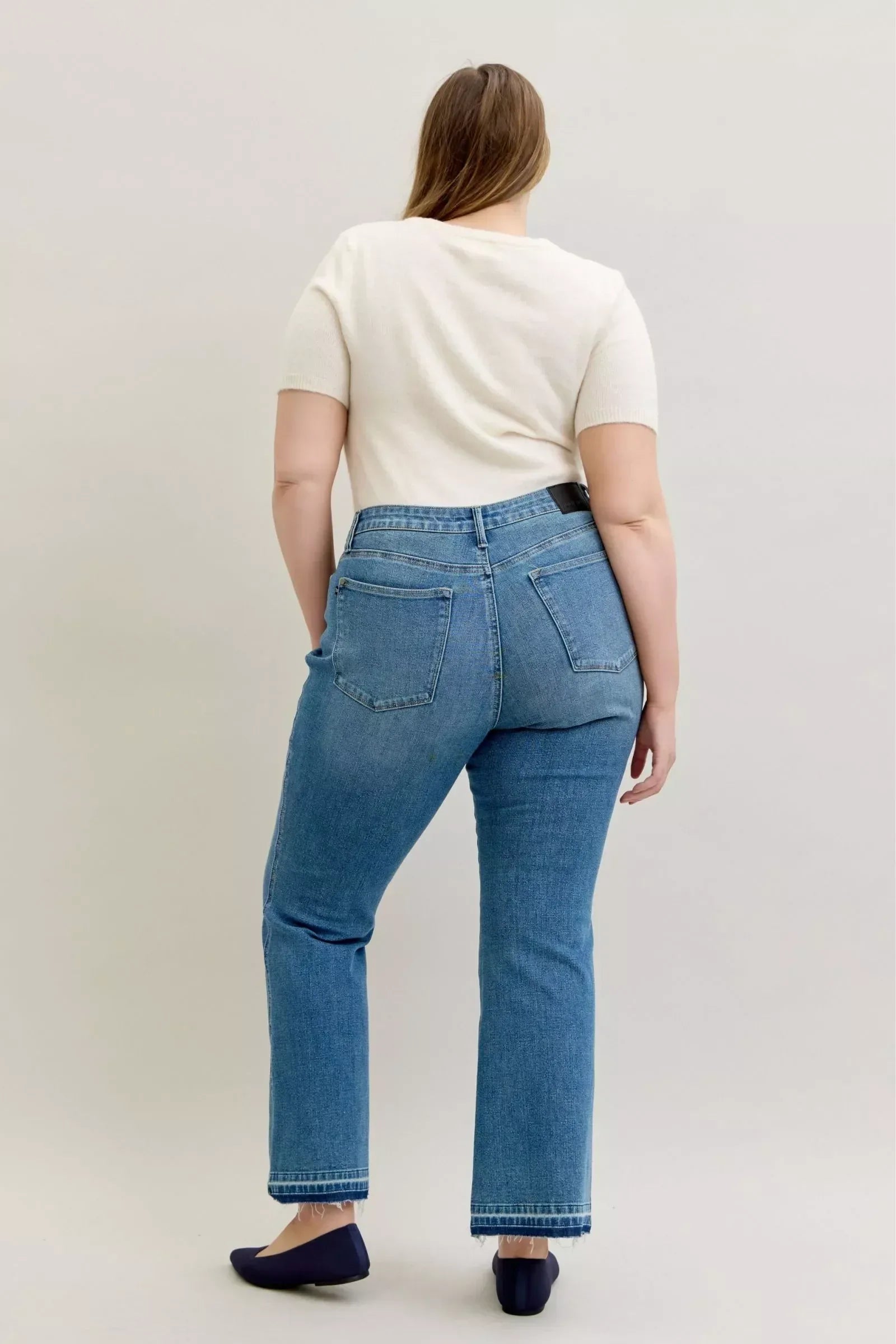Judy Blue Full Size Mid Rise Slim Bootcut Tummy Control Release Hem Jeans Plus Size - DAVERRI FASHIONS