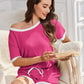 Pink and white off-the-shoulder ribbed pajama set by Daverri Fashions