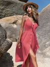 Coral V-neck sleeveless buttoned sundress with fitted bodice and flowing skirt