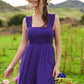 Vibrant purple Davi & Dani smocked bodice ruffle strap jumpsuit