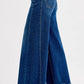RISEN high-rise ankle wide jeans plus size, back view, deep blue frayed hems