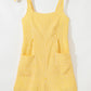 Daverri striped tie-shoulder romper with yellow white stripes pockets