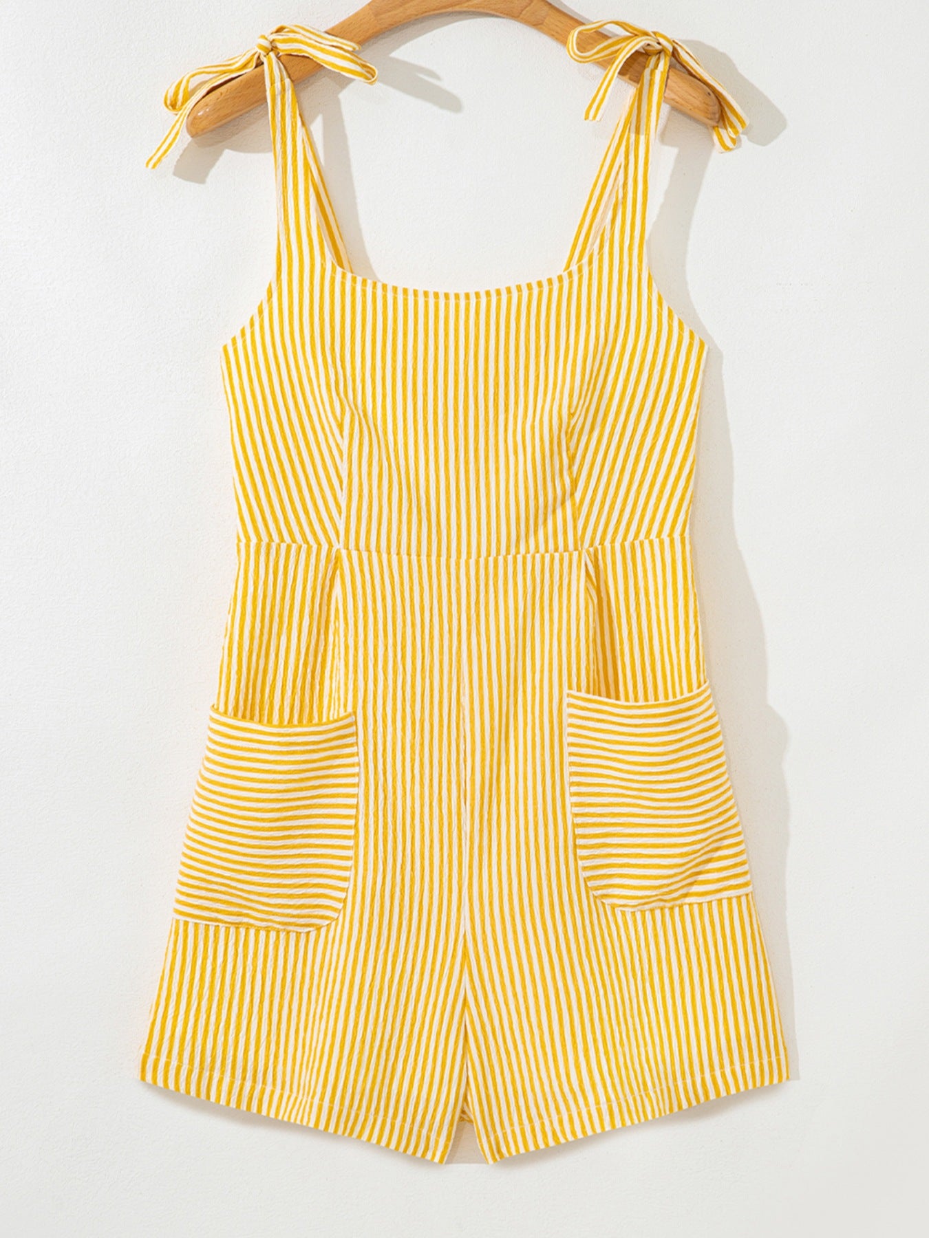 Daverri striped tie-shoulder romper with yellow white stripes pockets