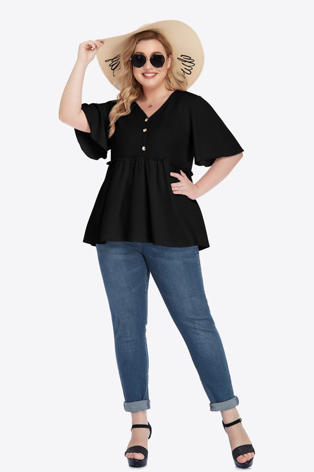 Plus size black peplum V-neck blouse with button front and frill trim