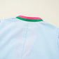 Light blue cotton shirt with pink and green striped collar on Notched Puff Sleeve Swing Dress